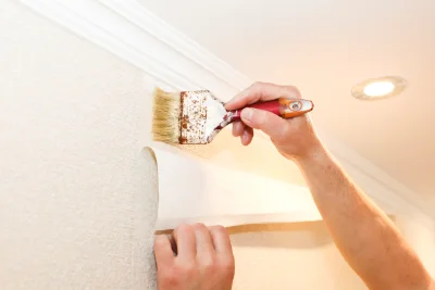 Pose de papier peint à Nicorps — revêtements muraux et toiles de verre